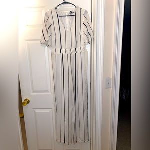 Black and white striped jumpsuit. Never worn